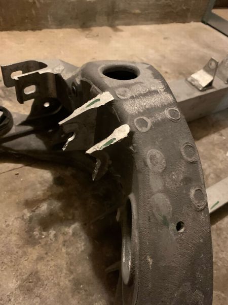 6007012-00-K Rear subframe Tesla Model S, SR, X Зламане вухо photo