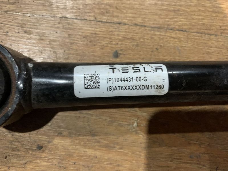 1044431-00-G Важіль задній поперечний сходження лівий правий Tesla Model 3 фото