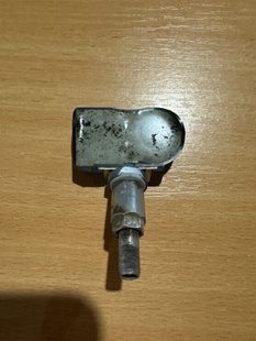 1034602-00-A Датчик тиску в шинах TPMS 433 MHz (SILVER WITH SILVER CAP) Tesla Model 3, S, SR, X фото