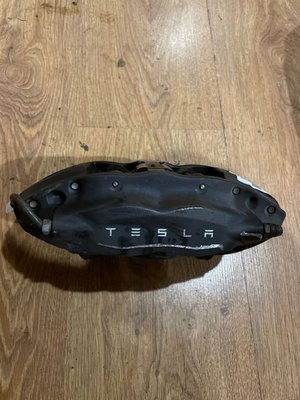 1042642-00-C Супорт гальмівний задній правий Tesla Model S Царапина фото
