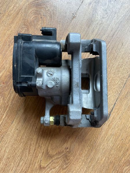 1044623-00-H Brake caliper rear left MANDO Tesla Model 3, Y photo